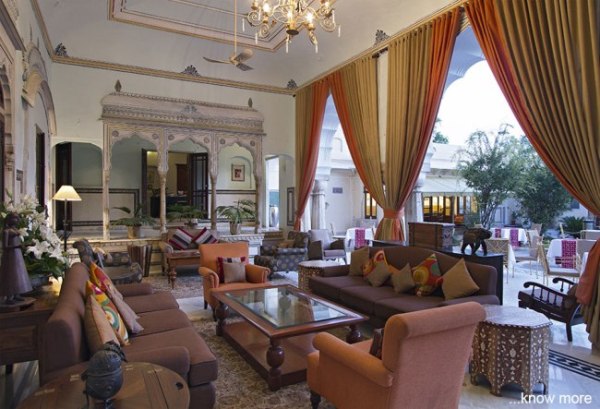 Samode Haveli: A majestic heritage hotel with intricate architecture, vibrant colors, and lush gardens.