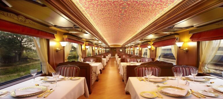 Lavish dining area inside the Palace on Wheels luxury train in India.